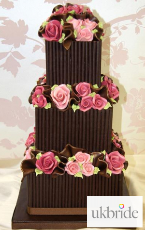 Dark-choc-scroll-&-pink-rose-wedding-cake.jpg