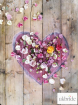 A-heart-shaped-decoration-strewn-with-rose-petals-makes-a-ch.jpg