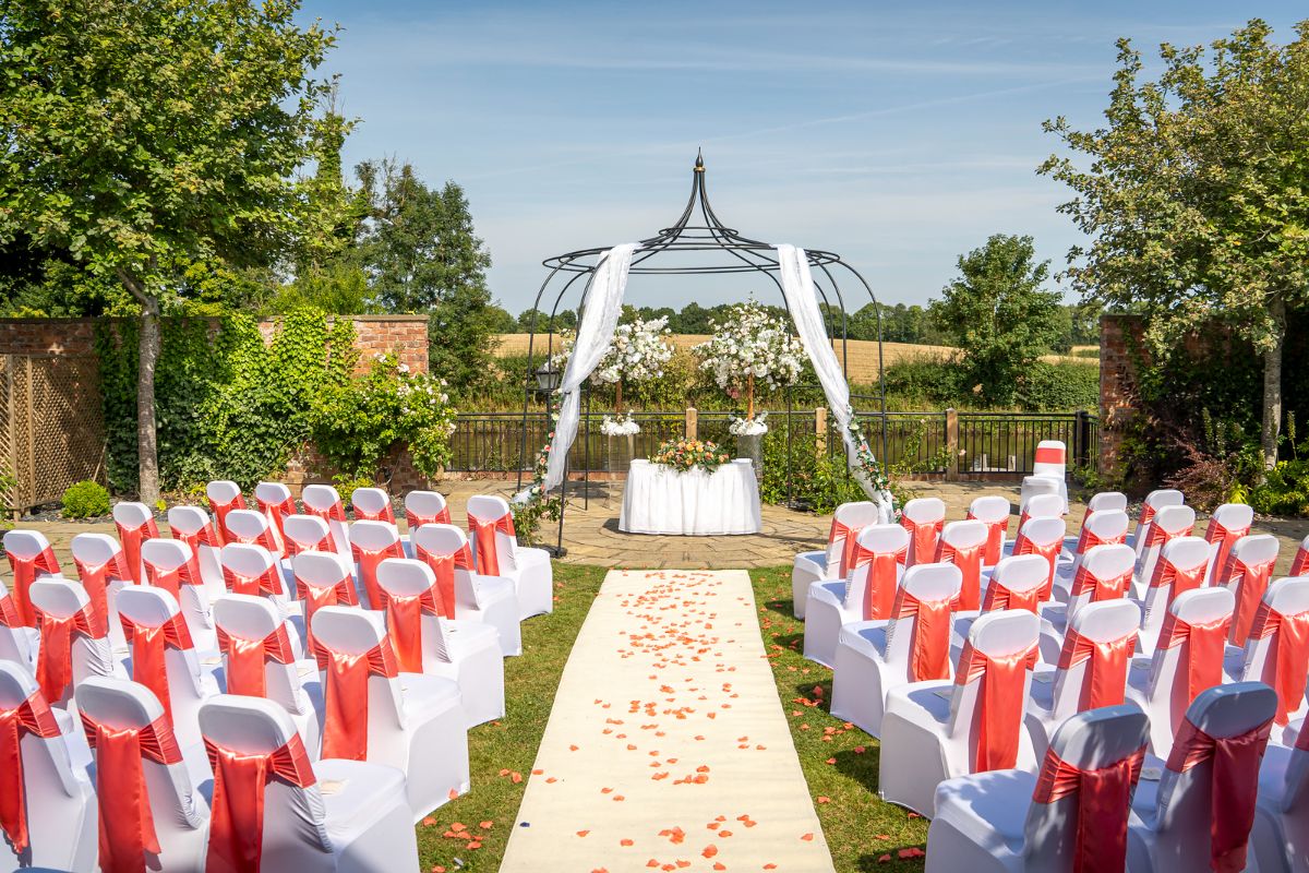 The outdoor ceremony was prepared ready for Jenna and Adam to celebrate their wedding day at Lion Quays Resort in Shropshire.