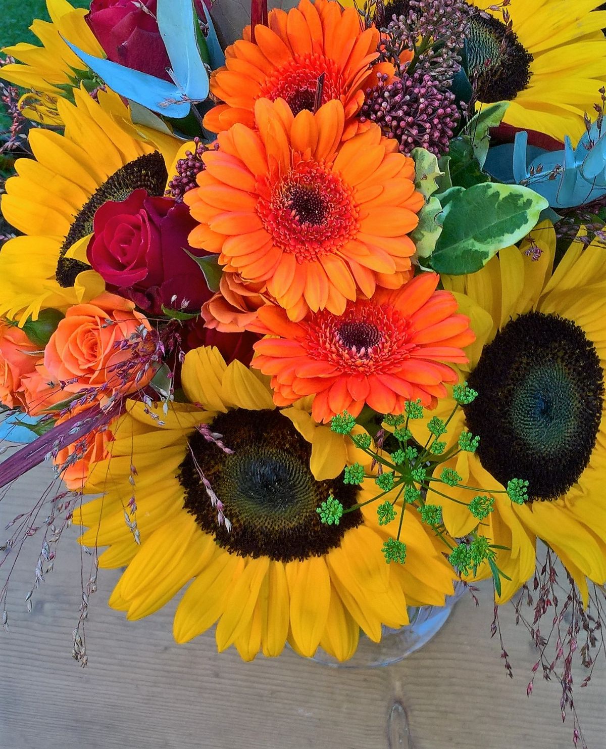 Sunflowers and bright orange gerberas