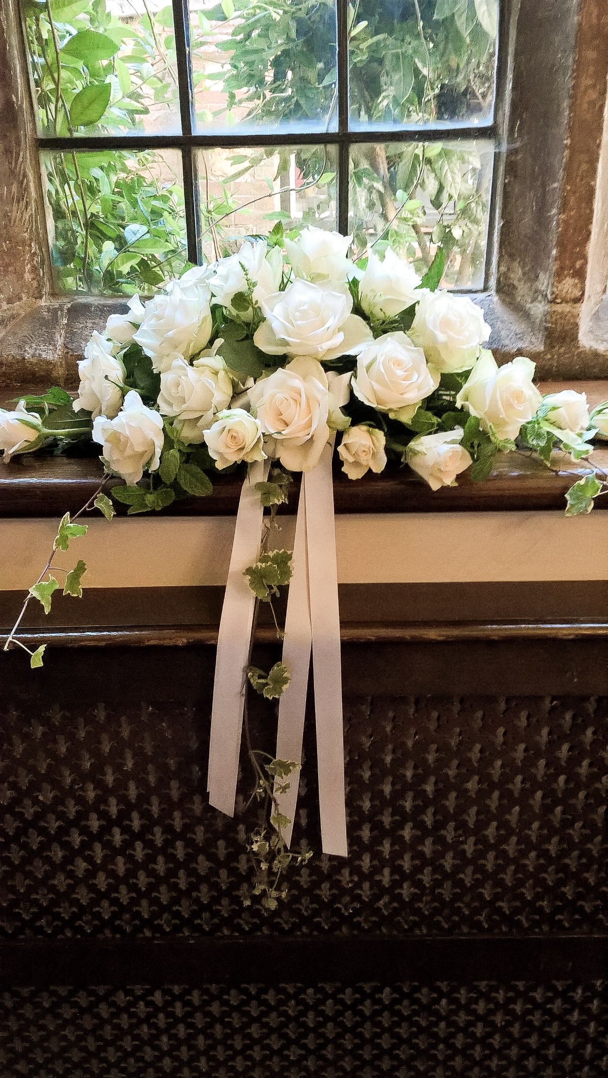 White roses for the ceremony room