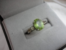 peridot-set-with-four-white-topaz-missing-one-though.jpeg