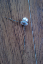 Put crystal loop through the pearl wire