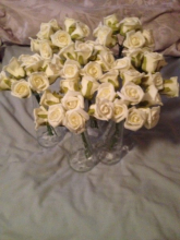 glass vases and roses