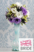 A-lisianthus,-cymbidium-orchid,-and-eryngium-thistle-vase-ar.jpg