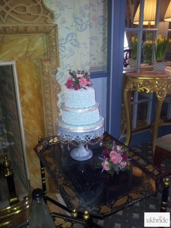 My Wedding cake with handmade sugar flowers to match my posey.jpg