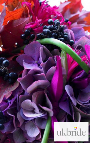 Bright-bridal-flowers-with-hydrangea,-nerines-and-dark-berri.jpg