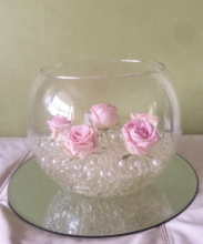 Our centre piece but with red roses and silver beads instead of pearl