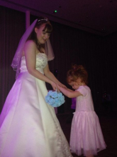 Dancing with the little girl who caught the bouquet
