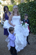 My MOH and her kids helping me with my dress