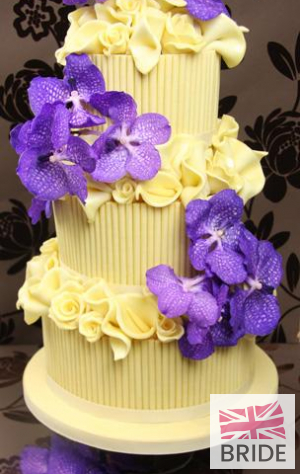 White-Choc-Scrolls,-Roses-&-16-Vanda-Orchids.jpg