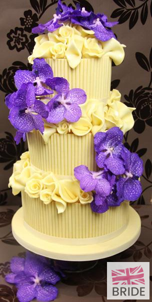 White-Choc-Scrolls,-Roses-&-16-Vanda-Orchids.jpg