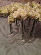 glass vases and roses