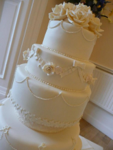 'swagging' that'll be on tier 1 and 3. it'll be single,double,single with pendant on where they join