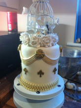 with gold painted fleur de lys on 