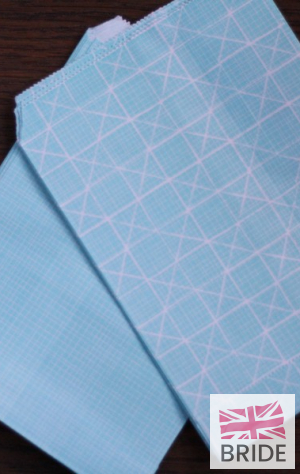 BLUEPAPERBAGSWITHGEOMETRICPATTERNSETOF243.60TheWeddingofmyDreams(1).jpg