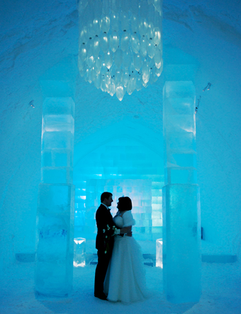 Claire and James, who opted to spend their wedding day in a distinctly chilly ice palace! Image by Oz of SF Photography.