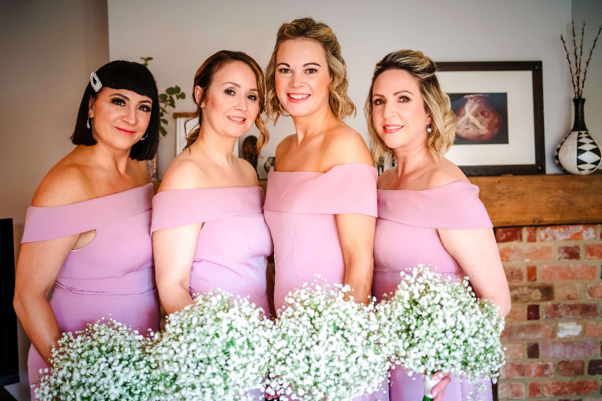 Gorgeous bridesmaids in their pink 