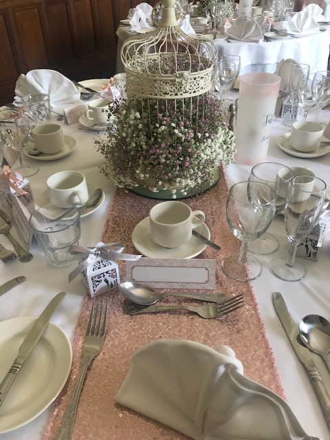 Delicate centerpieces show off by the showstopper runners.
