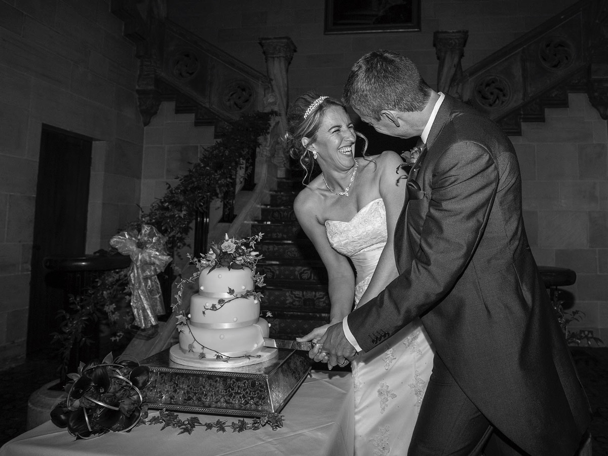 The Cutting of the Cake - the happy couple doing the honours