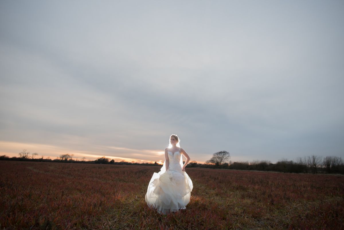 Bride at sunset at Southend Barns Chichester by Ali Gaudion