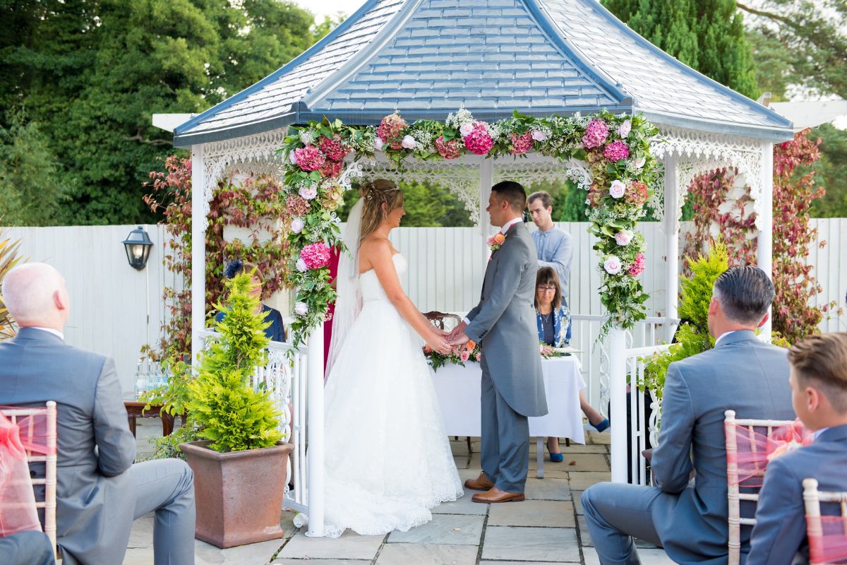 Outside wedding venue - pergola - Southdowns Manor in Hampshire Wedding Photographer - outside wedding venue