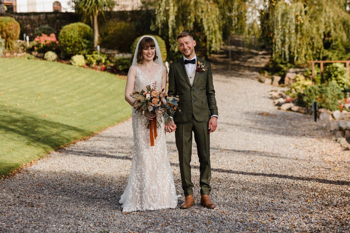 Couple in landscaped gardens