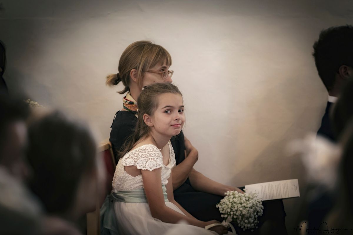 Vintage Look - Flower Girl watching the wedding service.