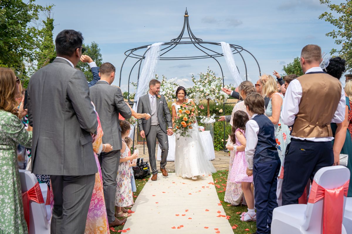 The happy couple following their nuptials, Jenna and Adam celebrate their wedding day at Lion Quays Resort in Shropshire.