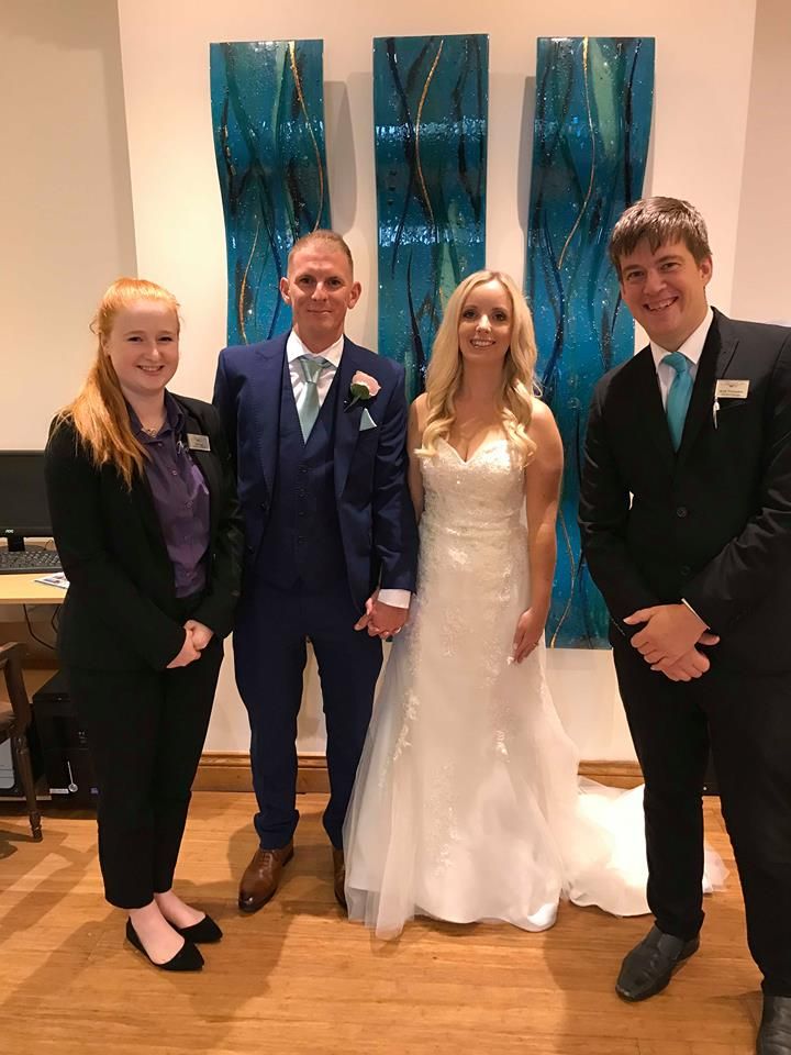 Wedding coordinator Kat with the happy couple and Operations Manager Andy