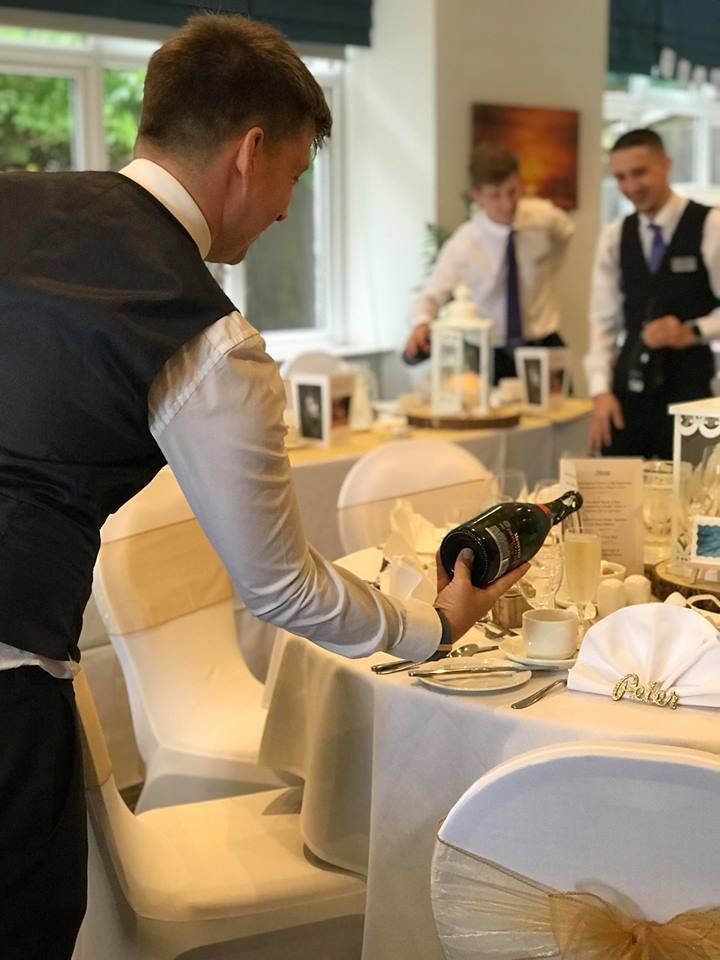 Pouring their drinks!