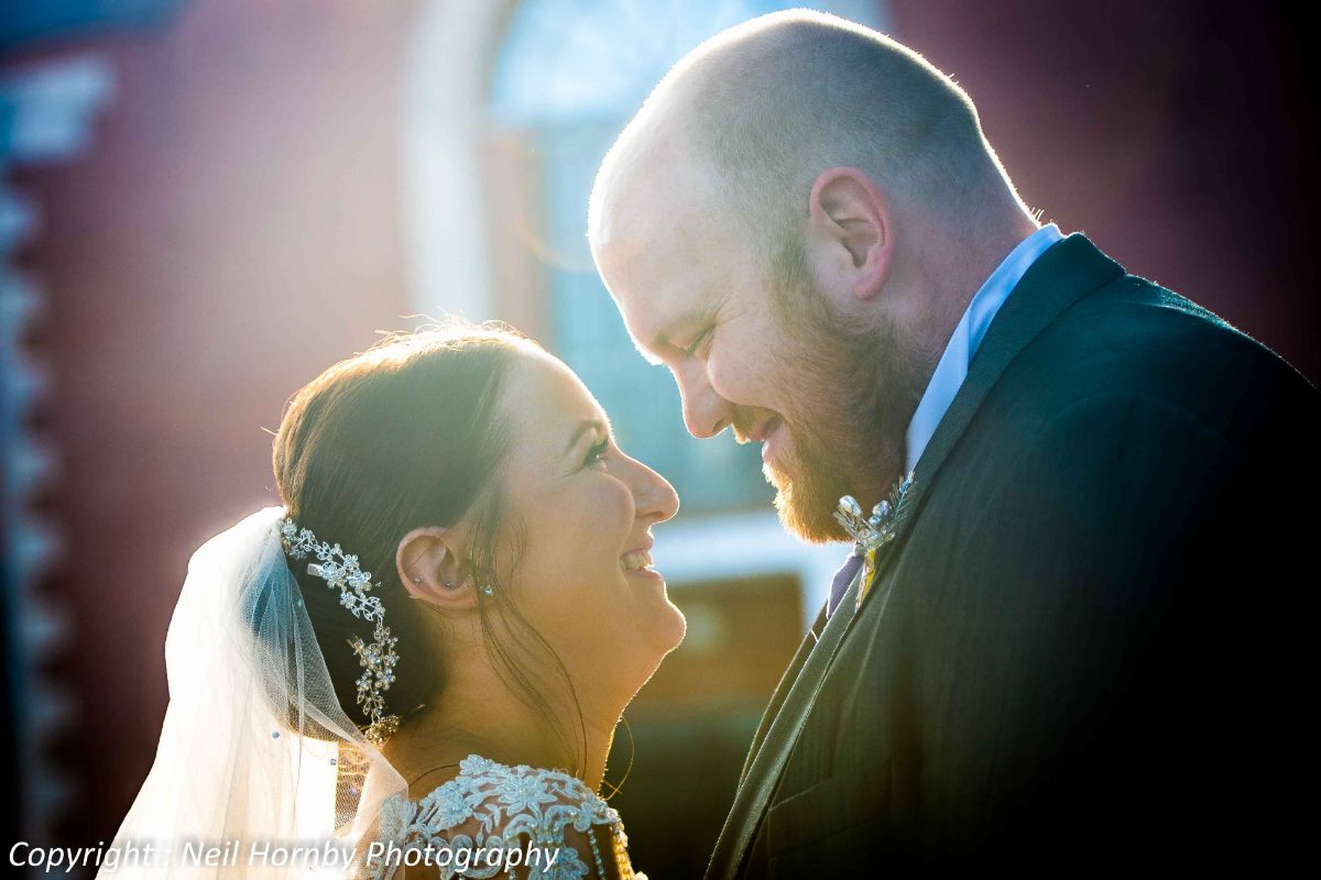 Sunsets make a beautiful back light to our couple 