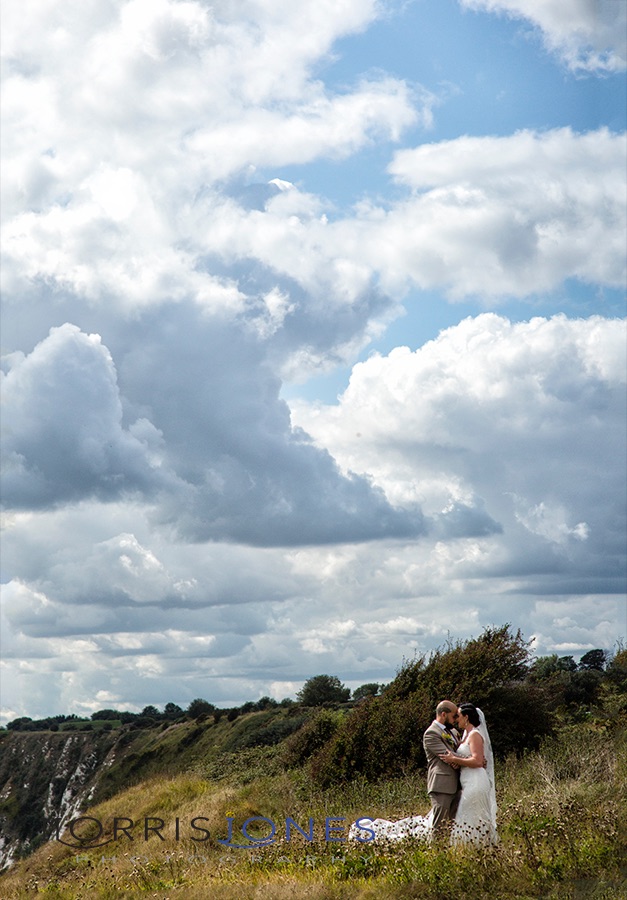 The drama of a billowing cloudy sky, the White Cliffs and a beautiful couple.