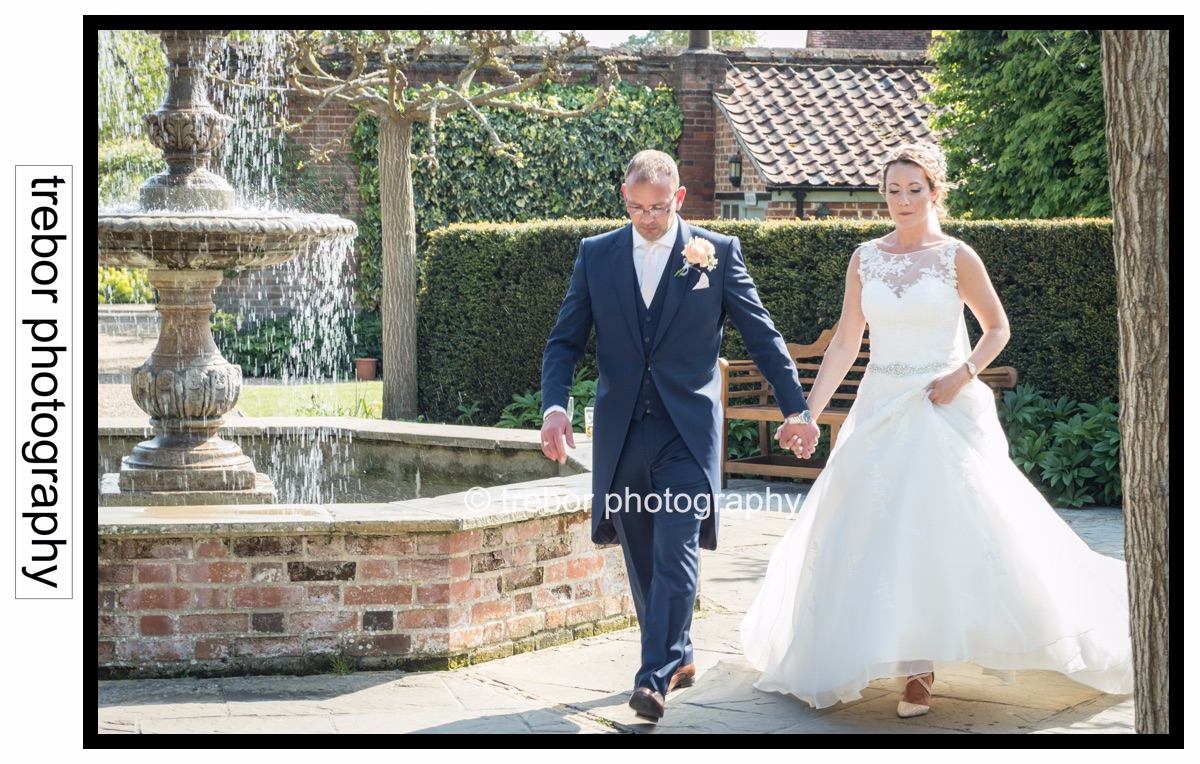 The happy couple just about to go in for their wedding breakfast. 