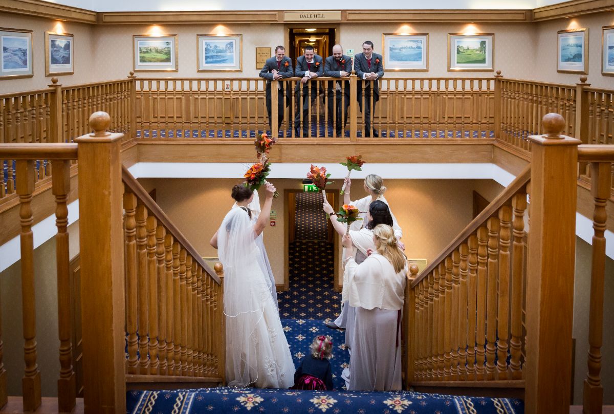 This is a really fun photo of the groomsmen with bridal party.