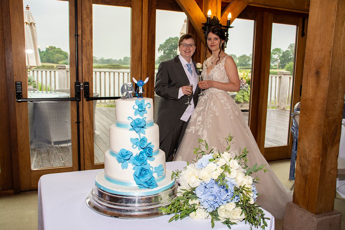 Couple with wedding cake
