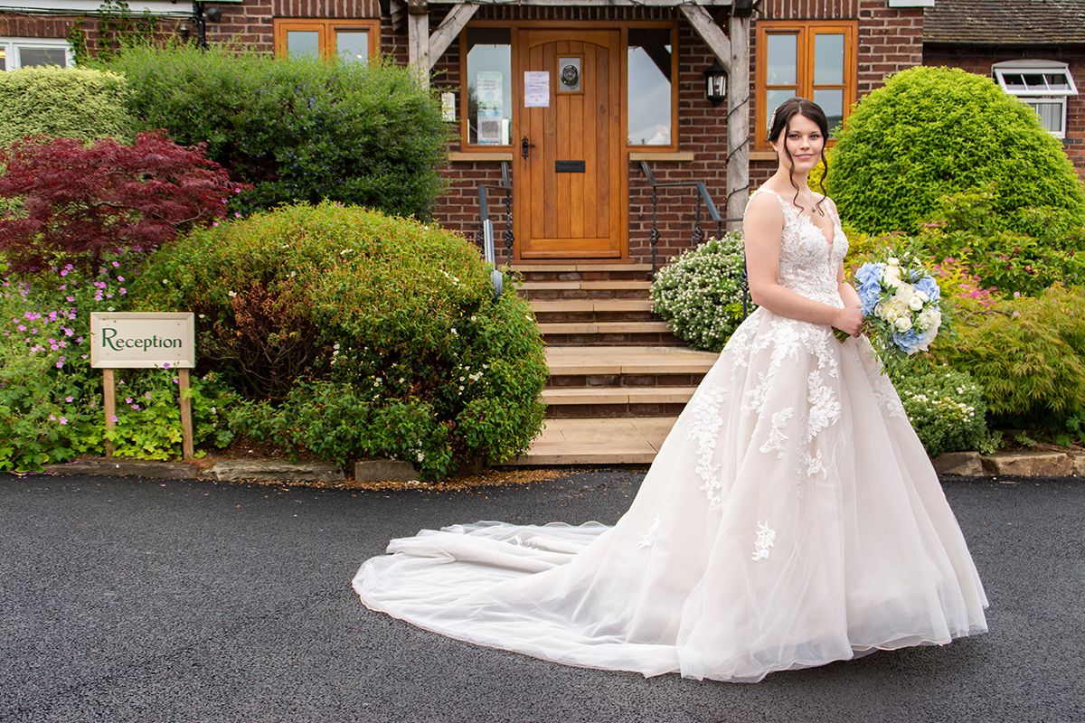 Bride outside reception