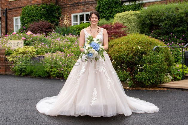 Stunning bride outside reception