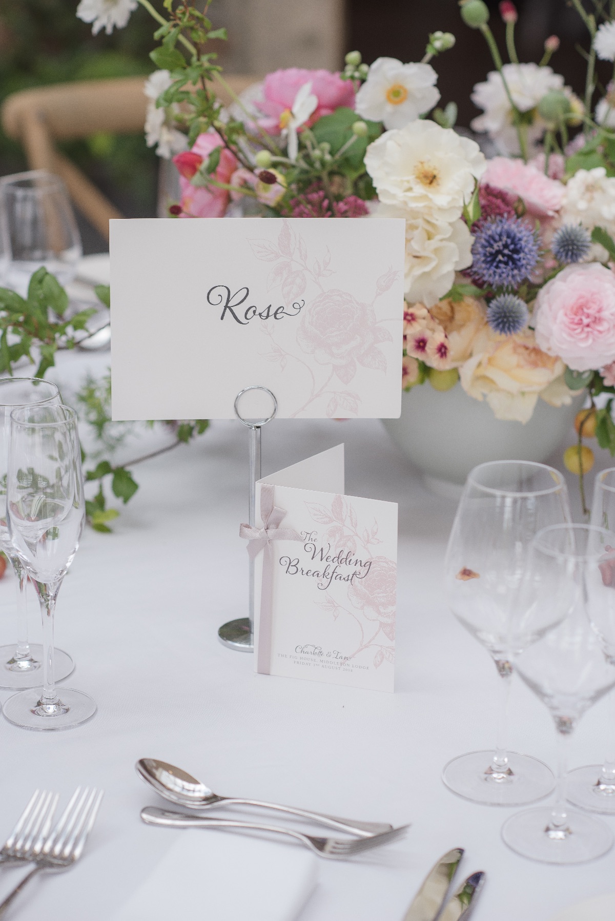 Table name and menu with gorgeous flowers at the wedding (Photograph by 