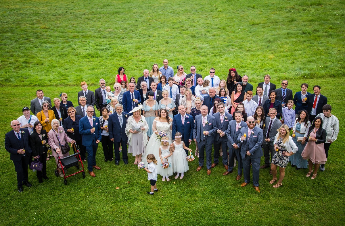 Group Photo of the entire wedding party - we were able to use our drone for some great aerial video and photography for their wedding