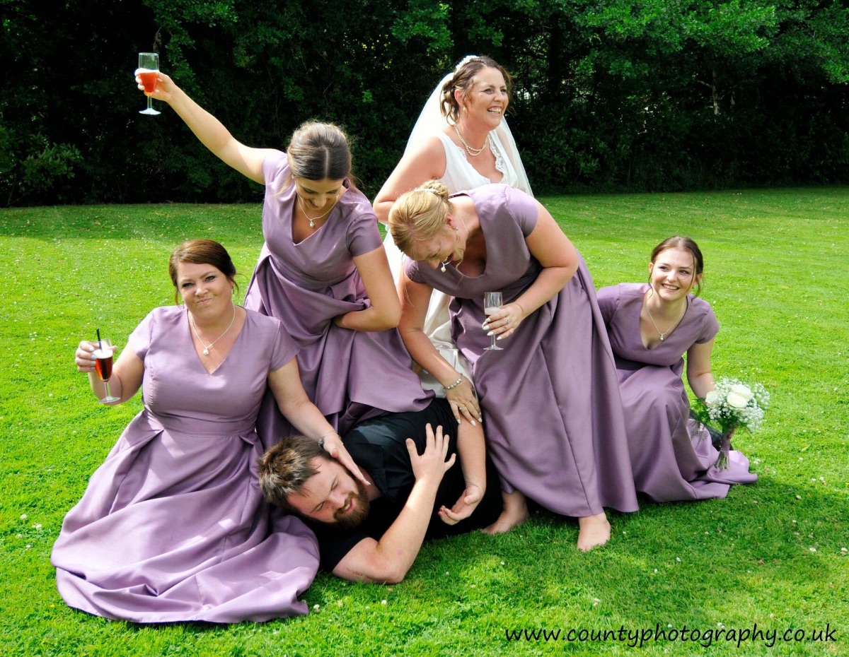 My bridesmaids and me sitting on the photographer 