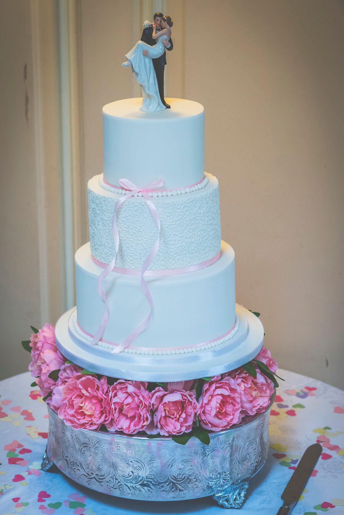 Our beautifully designed and scrumptious cake by Rebakers - flavours included white chocolate, salted caramel and chocolate caramel. All the cake was gone before we had a chance to have any!