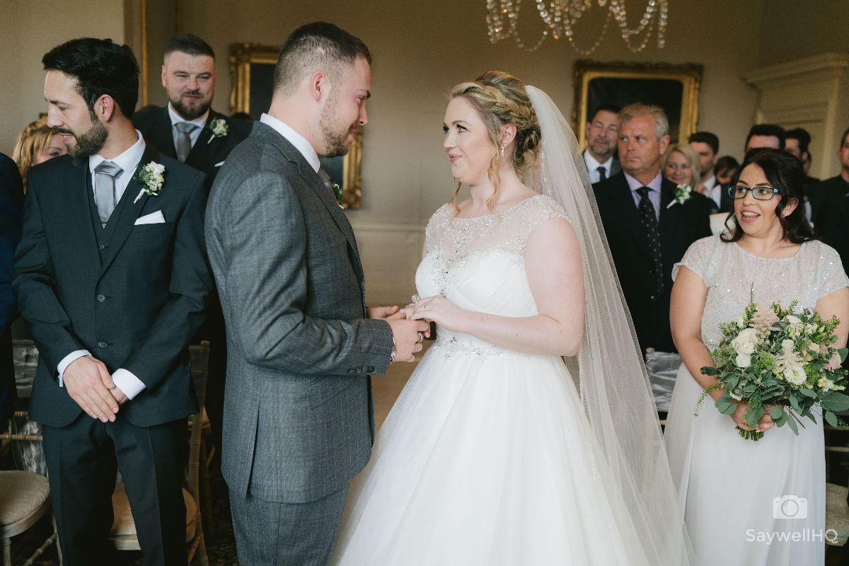 Norwood Park Wedding Photography - Bride and Groom holding hands as the new Mr and Mrs