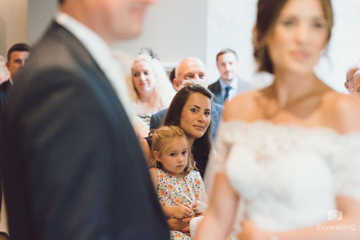 Chequers Inn Wedding Photography - Wedding guest looking on