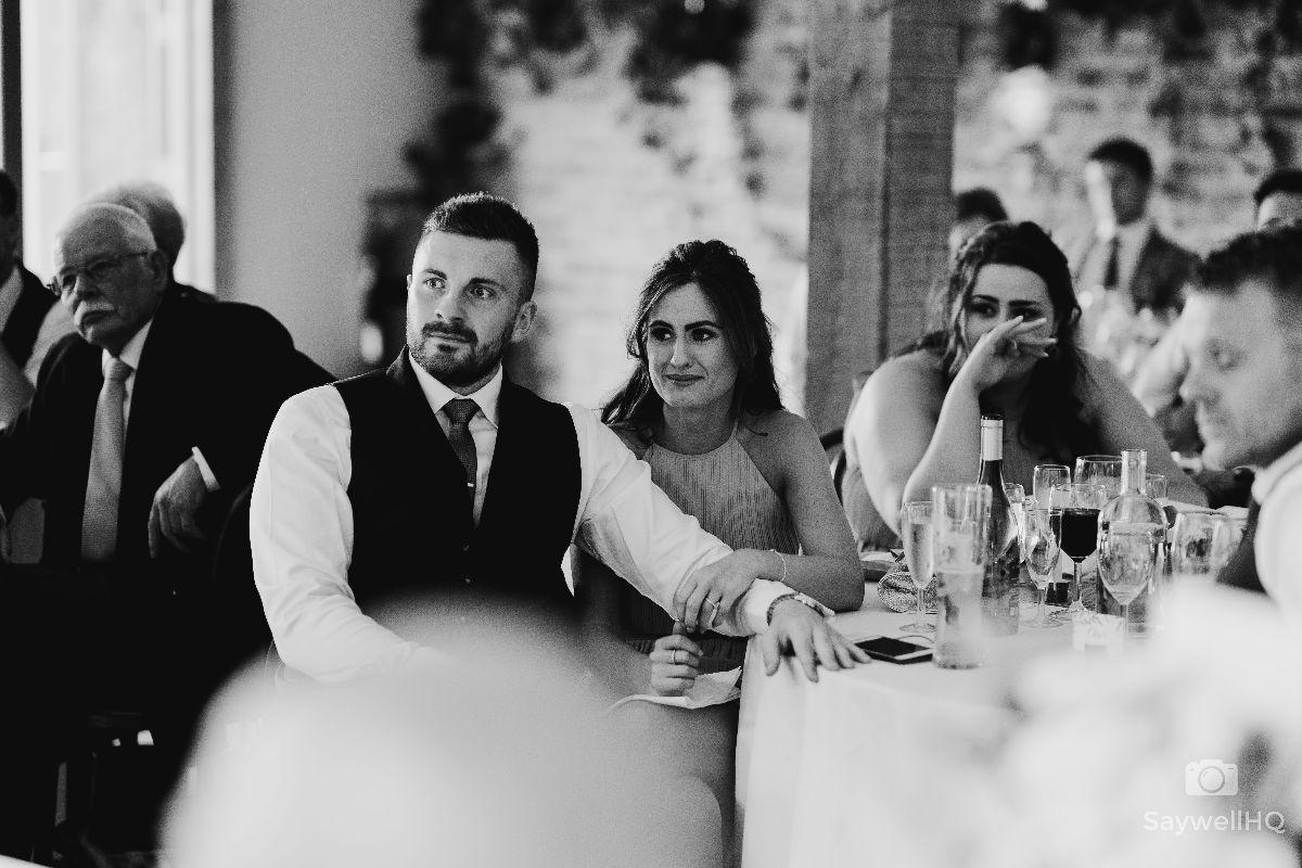 Hazel Gap Barn Wedding Photography - guest reactions to the wedding speeches