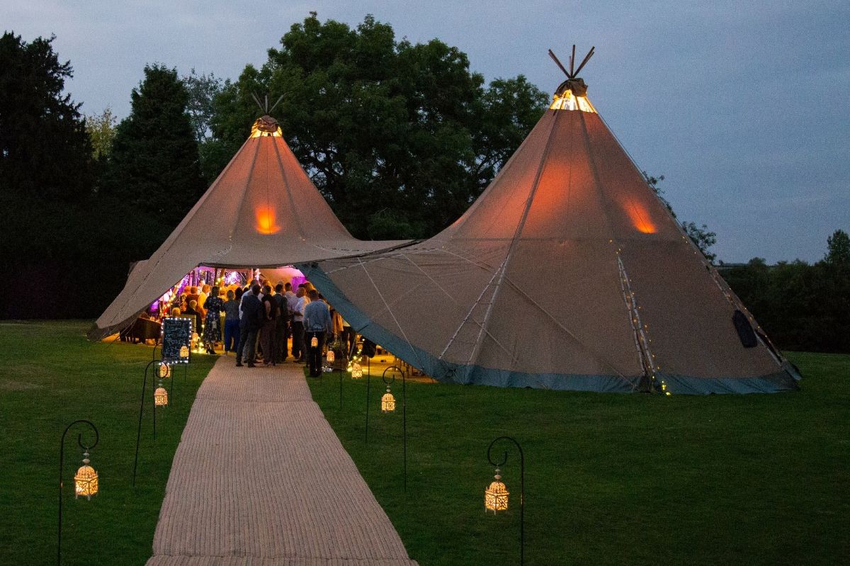 Tipis lit up for the evening