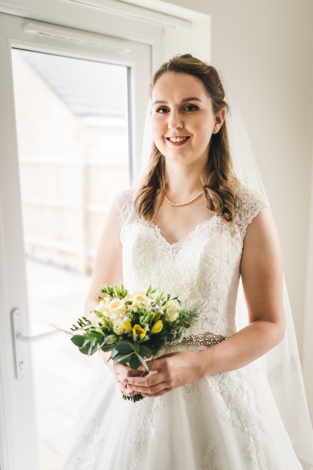Window light bridal portrait