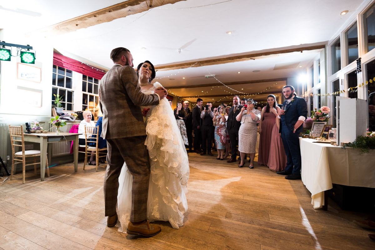bride and grooms first dance at The Secret Gardens in Ashford