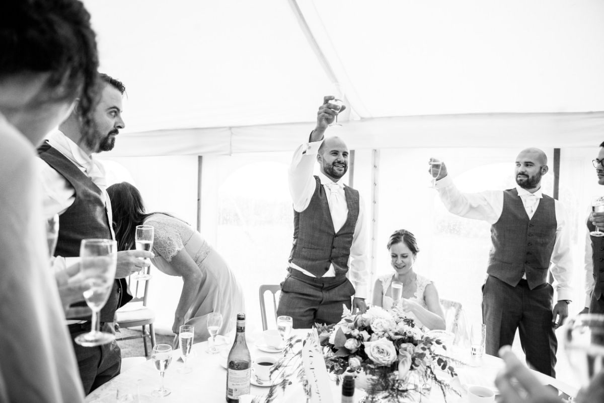 Groom preposes a toast at The Mount Ephraim Gardens