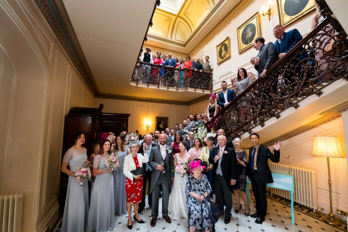 As the rain pounds down outside at The Mount Ephraim Gardens, we are forced to photograph the who wedding party inside the grand hall.